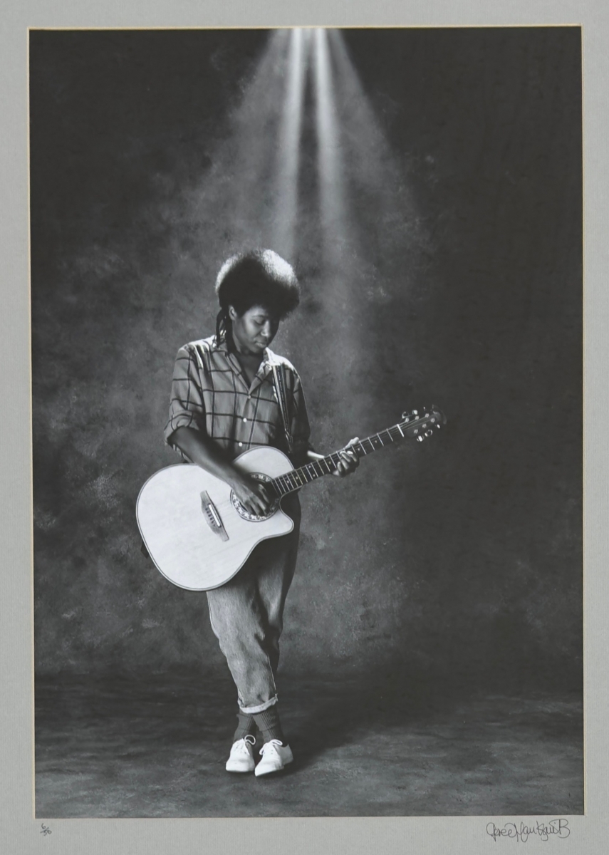 Lot Number 5. Gered Mankowitz (born 1946) - Joan Armatrading studio portrait, 1984, printed later, limited edition Focus edition bromide print, signed by the artist and numbered 6/50 to the lower mount, framed 24.5 x 21